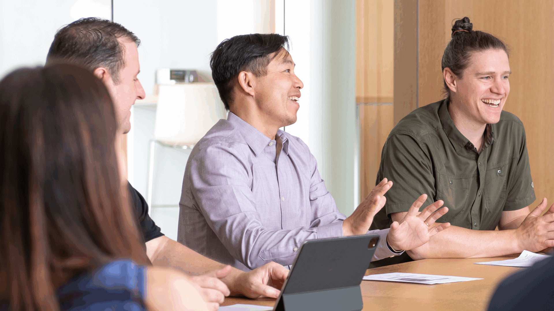 GHT Medical Gases Engineer, James Yang, speaking with colleagues